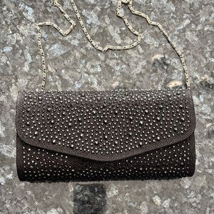 Black hard shell evening bag